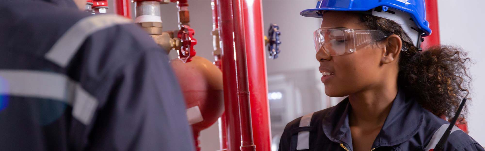 man inspecting water heater