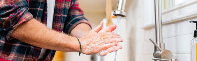 man washing hands